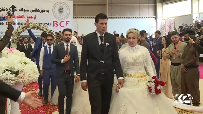 بالصور.. اربيل تحتضن عرسا جماعيا لـ 214 شابا وشابة